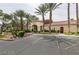 Charming community clubhouse with beautiful landscaping and ample parking at 7885 W Flamingo Rd # 2019, Las Vegas, NV 89147