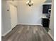 Comfortable dining area with hardwood flooring and ample space at 7885 W Flamingo Rd # 2019, Las Vegas, NV 89147