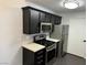 Kitchen featuring modern appliances and sleek countertops at 7885 W Flamingo Rd # 2019, Las Vegas, NV 89147