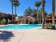 Resort-style pool with ample deck space and palm trees, perfect for relaxation and recreation at 7885 W Flamingo Rd # 2019, Las Vegas, NV 89147