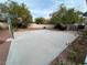 Spacious backyard featuring a concrete court and minimal landscaping at 8138 Yucca Springs Dr, Las Vegas, NV 89129
