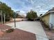 Large concrete backyard with basketball hoop at 8138 Yucca Springs Dr, Las Vegas, NV 89129