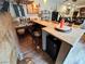 Entertaining bar featuring counter seating, sink, and beverage refrigeration at 8138 Yucca Springs Dr, Las Vegas, NV 89129