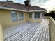 This spacious outdoor wooden deck is great for relaxing and entertaining guests, and shows great property views at 8138 Yucca Springs Dr, Las Vegas, NV 89129