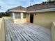 Spacious wooden deck features a tile roof and stucco siding, offering a blend of style and durability, great for outdoors at 8138 Yucca Springs Dr, Las Vegas, NV 89129