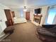 Spacious main bedroom with a fireplace, sitting area, and ample closet space at 8138 Yucca Springs Dr, Las Vegas, NV 89129