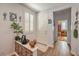 Welcoming foyer with wood-look flooring, decor, and bright light at 8247 Oasis Bloom St, North Las Vegas, NV 89085