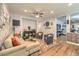 Comfortable living area with wood-look floors, modern decor, and a neutral color scheme at 8247 Oasis Bloom St, North Las Vegas, NV 89085