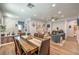 Open concept living room with wood floors, modern decor, and lots of natural light at 8247 Oasis Bloom St, North Las Vegas, NV 89085