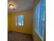 Bedroom with large window allowing ample natural light and neutral carpet at 8325 Aspen Village St, Las Vegas, NV 89113
