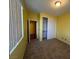 Bedroom with closet, neutral walls, and neutral carpet at 8325 Aspen Village St, Las Vegas, NV 89113