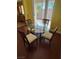 Cozy dining area with a glass table and seating for four at 8325 Aspen Village St, Las Vegas, NV 89113