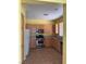 Efficient kitchen featuring stainless steel appliances and tile flooring at 8325 Aspen Village St, Las Vegas, NV 89113