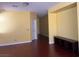 Open-concept living room with sleek wood flooring and a neutral color palette at 8325 Aspen Village St, Las Vegas, NV 89113