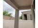 Back porch with privacy fence and view of the roof at 8325 Aspen Village St, Las Vegas, NV 89113