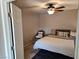 Inviting bedroom featuring a ceiling fan, soft lighting, and calm ambiance at 8345 Mozley Park St, Las Vegas, NV 89113