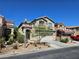 Charming two-story home with manicured landscaping and a two-car garage at 8345 Mozley Park St, Las Vegas, NV 89113