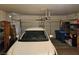 Spacious garage with ample storage, car, and modern door hardware in a well-organized area at 8345 Mozley Park St, Las Vegas, NV 89113