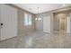 Inviting dining area with shuttered windows and tile floors at 8562 Insignia Ave # 102, Las Vegas, NV 89178