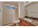 Bathroom featuring a shower with sliding glass door and granite countertop sink vanity at 8613 Linderwood Dr, Las Vegas, NV 89134