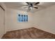 Cozy bedroom with neutral carpet and a bright window offering natural light at 8613 Linderwood Dr, Las Vegas, NV 89134