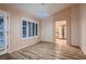Bright dining area with modern lighting fixtures and wood flooring connecting to the kitchen at 8613 Linderwood Dr, Las Vegas, NV 89134