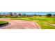 Beautiful community golf course featuring lush green fairways, sand traps and a tranquil water feature at 8613 Linderwood Dr, Las Vegas, NV 89134