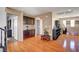 Hallway featuring hardwood floors, doorways, built-in cabinets, and access to multiple rooms at 9065 W Torino Ave, Las Vegas, NV 89148