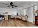 Spacious living room with lots of light and wood laminate flooring at 9065 W Torino Ave, Las Vegas, NV 89148