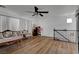 Spacious living room with lots of light and wood laminate flooring at 9065 W Torino Ave, Las Vegas, NV 89148