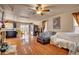Open-concept living room with hardwood floors offers seamless flow to the kitchen and dining area at 9065 W Torino Ave, Las Vegas, NV 89148