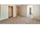 Bedroom with carpeted floors, closet, and door leading to another room at 9324 Freedom Heights Ave, Las Vegas, NV 89149