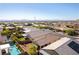 Scenic residential area with inviting homes, lush greenery, and a community pool for leisure and recreation at 10742 Cowlite Ave, Las Vegas, NV 89166