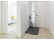 A light and airy entryway features a tiled floor, white walls, and a glimpse of the bedroom at 10742 Cowlite Ave, Las Vegas, NV 89166