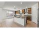 Stylish kitchen with stainless steel appliances, granite countertops, and a center island at 10851 Hanwicke Harbor Ave, Las Vegas, NV 89166