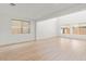Spacious living room with hardwood floors and natural light, perfect for relaxing and entertaining at 10851 Hanwicke Harbor Ave, Las Vegas, NV 89166