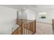 Open loft area with neutral carpet, white walls, and natural light from the window at 10851 Hanwicke Harbor Ave, Las Vegas, NV 89166