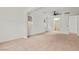 Spacious main bedroom featuring plush carpeting, ample natural light, and a ceiling fan at 10851 Hanwicke Harbor Ave, Las Vegas, NV 89166
