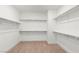 Walk-in closet with carpet and open shelving providing plenty of storage at 10851 Hanwicke Harbor Ave, Las Vegas, NV 89166