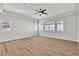 Spacious bedroom with wood flooring and plantation shutters at 11621 La Mirago Pl, Las Vegas, NV 89138