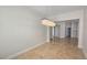 Dining area with travertine floors and modern chandelier at 11621 La Mirago Pl, Las Vegas, NV 89138