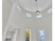 High ceilings and abundant natural light in a neutral, freshly painted foyer at 11621 La Mirago Pl, Las Vegas, NV 89138