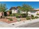 Charming single story home with desert landscaping, privacy wall and mature tree at 11621 La Mirago Pl, Las Vegas, NV 89138