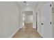 Inviting hallway with tile flooring, neutral paint, and an open layout for a bright and welcoming entrance at 11621 La Mirago Pl, Las Vegas, NV 89138