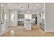 Modern kitchen featuring gray cabinets, a center island, and stainless steel appliances at 11621 La Mirago Pl, Las Vegas, NV 89138