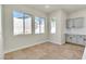 Bright and airy kitchen with sleek cabinets, a breakfast nook, and plenty of natural light at 11621 La Mirago Pl, Las Vegas, NV 89138