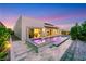 Backyard featuring a pool, spa, patio area, and contemporary home exterior at 11895 Skyline Arch Ct, Las Vegas, NV 89138