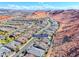 Beautiful aerial view of a desert neighborhood with mountain views in the background at 125 Mirage View Dr, Henderson, NV 89011