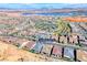 Scenic aerial view of the community with lake views at 125 Mirage View Dr, Henderson, NV 89011