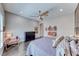 Relaxing bedroom features a large window and a sleek ceiling fan at 125 Mirage View Dr, Henderson, NV 89011